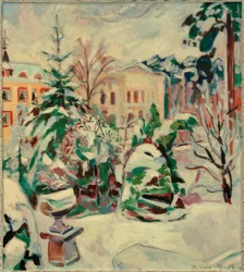 Parque nevado con casas